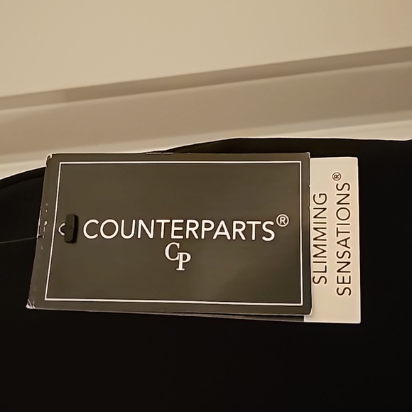 Black pants by Counterparts. Size 12. Pull on slacks with no pockets. - Picture 2 of 3